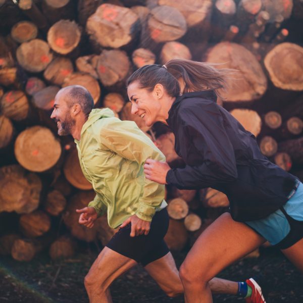 Man and woman running on the mountain. Area of Madrid Spain.